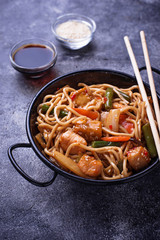 Stir fry noodles with chicken, tofu and vegetable.