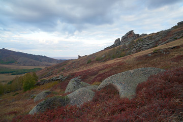Autumn on the Ku mountain range. A mountain range is a series of mountains or hills ranged in a line and connected by high ground. 