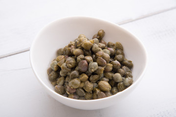 isolated pickled capers