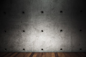 Dark concrete wall and wooden floor