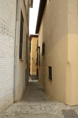 Narrow alley  in Granada, Spain