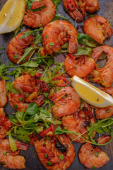 Large grilled BBQ shrimp with sweet chili sauce, green onion and lemon.