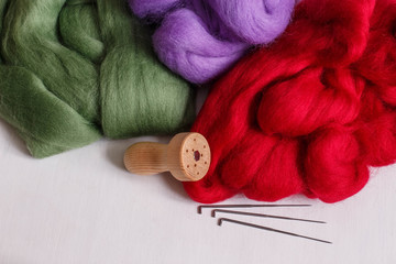 the art materials: colored wool for dry and wet felting and needle