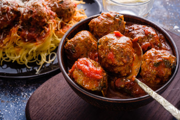 Delicious homemade meat balls in tomato sauce.