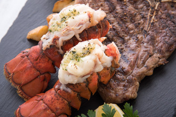 grilled lobster tail and T bone steak