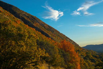 Fototapeta na wymiar Autumn mountainside with clouds