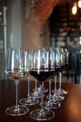 Glasses of white and red wine