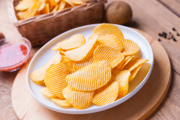 Crispy potato chips, potato and sauce 