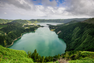 Panoramic landscape from Azores lagoons. The Azores archipelago has volcanic origin and the island of São Miguel has many lakes formed in craters of ancient volcanoes. The main tourist destination.