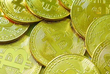 Many golden bitcoin replica. Business and finance concept.