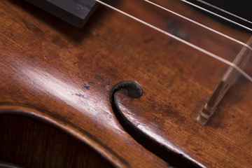 A violin on a dark background