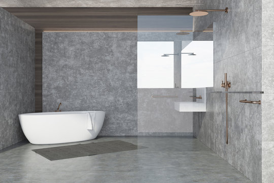 Concrete wall bathroom interior, white tub