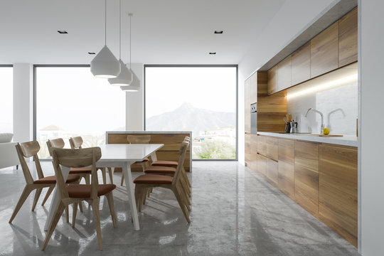 Panoramic kitchen interior, white table