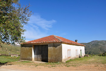 Fototapeta na wymiar Abandoned village house from Gokceada in Aegean Turkey