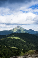 Clouds over the mountains. Mountain landscape.