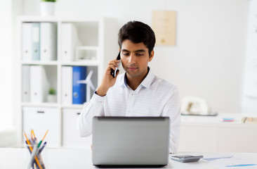 businessman calling on smartphone at office