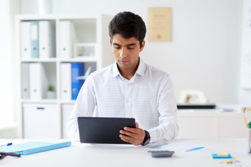 businessman working with tablet pc at office