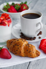 healthy breackfast for healthy Breakfast with delicious croissant and strawberries for early morning