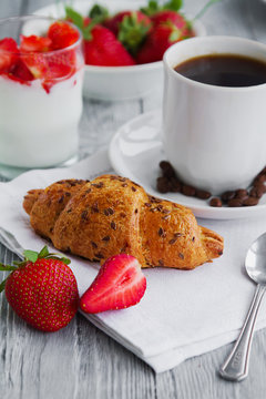 healthy breackfast for healthy Breakfast with delicious croissant and strawberries for early morning