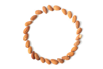 A lot of almond grains on a white background.