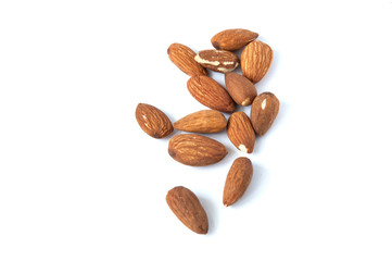 A lot of almond grains on a white background.