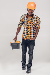 African American worker with tool box