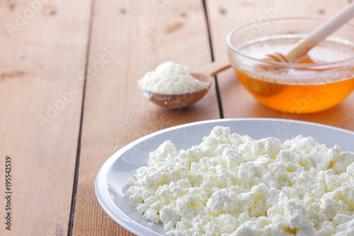 Cheese Fresh Cottage Cheese In A White Plate Wooden Spoon