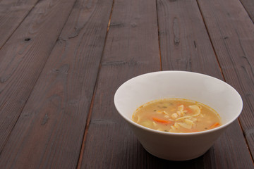 Bean soup with noodles on a background