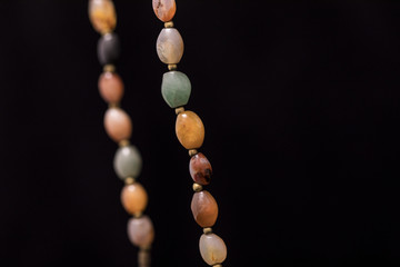 Parts of a neklace with colorful gems