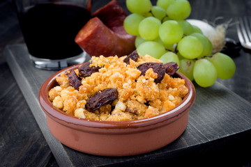 bread crumbs cooked with grapes, typical stew of the shepherds of Navarra, Spain
