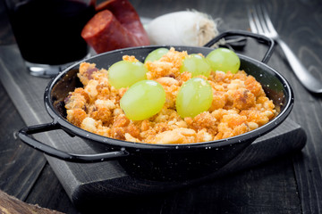 bread crumbs cooked with grapes, typical stew of the shepherds of Navarra, Spain