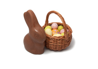 Chocolate rabbit with basket isolated on the white