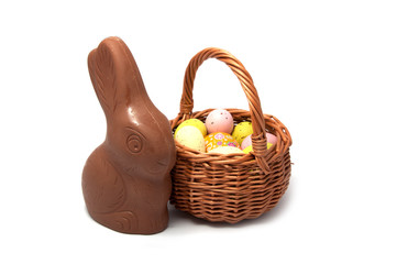 Chocolate rabbit with basket isolated on the white