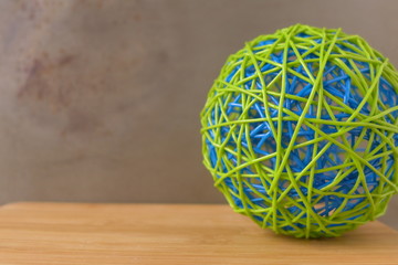 ball of rubber band on desk