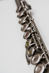 Obraz premium Close up of keys from a flute. Classical musical instrument