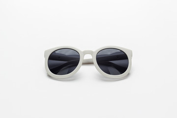 studio shot of white sunglasses not isolated