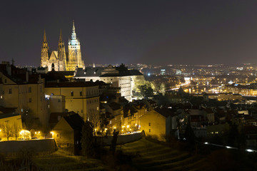 Fototapeta na wymiar Winter night Prague City with gothic Castle, Czech Republic