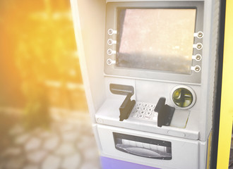 Close-up entering PIN numbers buttons ATM on bank machine . Concept of insecure strangers ,  online...
