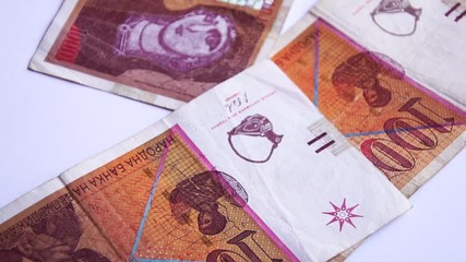 Macedonian money in slow motion close up view