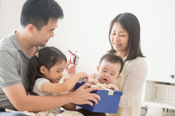 Happy Asian Family and gift box