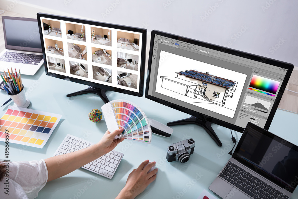 Poster Designer Working On Color Selection For House