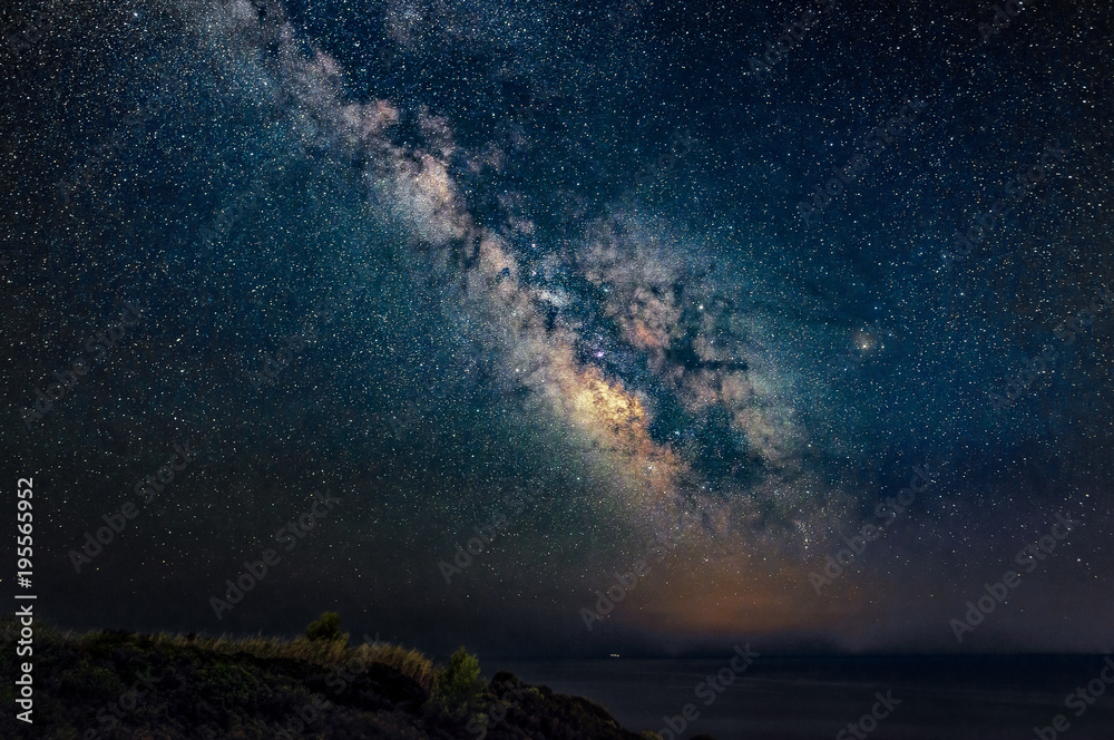 Wall mural miliky way over the aegean sea. milky way galaxy from peninsula kassandra, halkidiki, greece. the ni