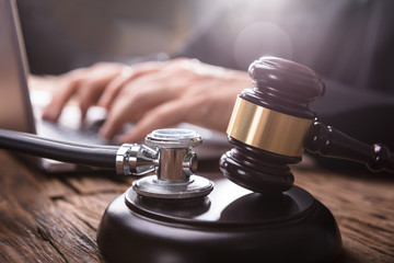 Close-up Of Stethoscope And Gavel