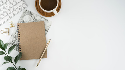 Styled stock photography white office desk table with blank notebook, computer, supplies and coffee cup. Top view with copy space. Flat lay. - obrazy, fototapety, plakaty