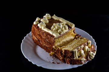 delicious home made biscuit cake on a black background