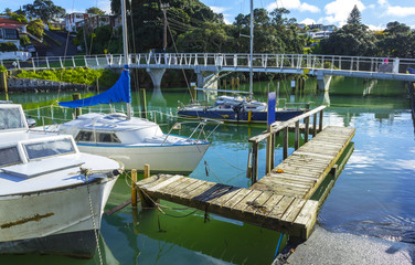 Fototapeta na wymiar Boat Marina at Milford Beach Auckland, New Zealand