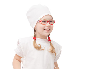 young girl with glasses plays in the doctor