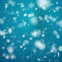 snowfall from New Year's snowflakes on a blue background.