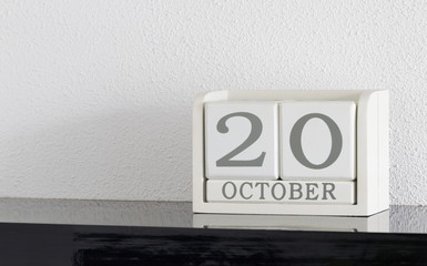 White block calendar present date 20 and month October