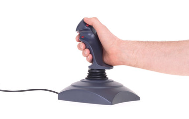 Hand holding gaming joystick